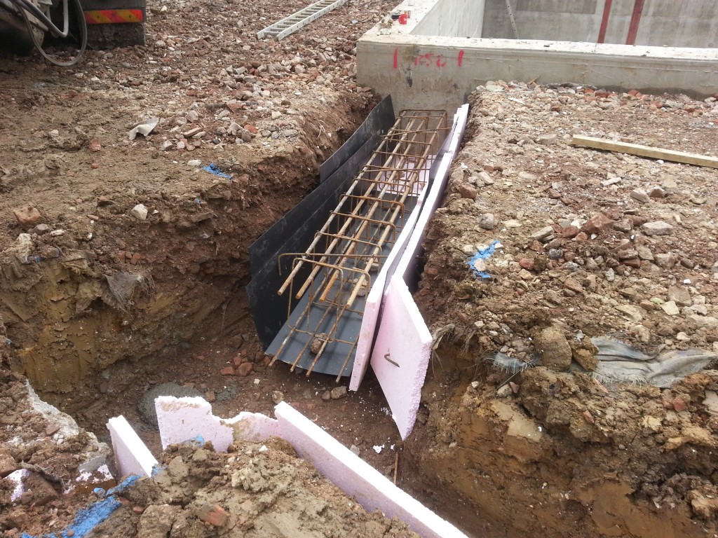 Reinforcing linking basement walls to the house foundations